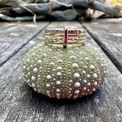 Rings: 9 carat gold and sterling silver fine unity ring