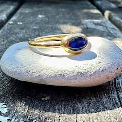 Rings: Black opal (.66ct) ring