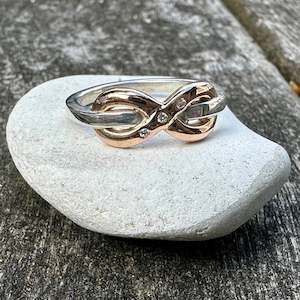 Half Price: 9 ct rose gold and sterling silver eternity ring