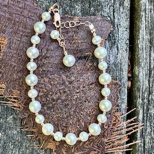 Pearls: Small round white freshwater pearl bracelet
