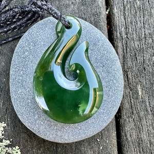 Pounamu New Zealand Taonga: small dark NZ greenstone matau