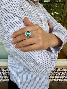 Spinner And Unity Rings: 12ct blue topaz unity ring