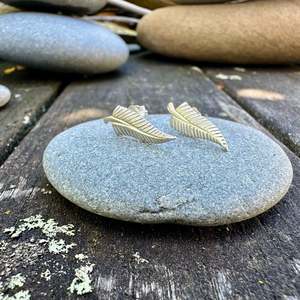 Stud Earrings: small silver fern studs